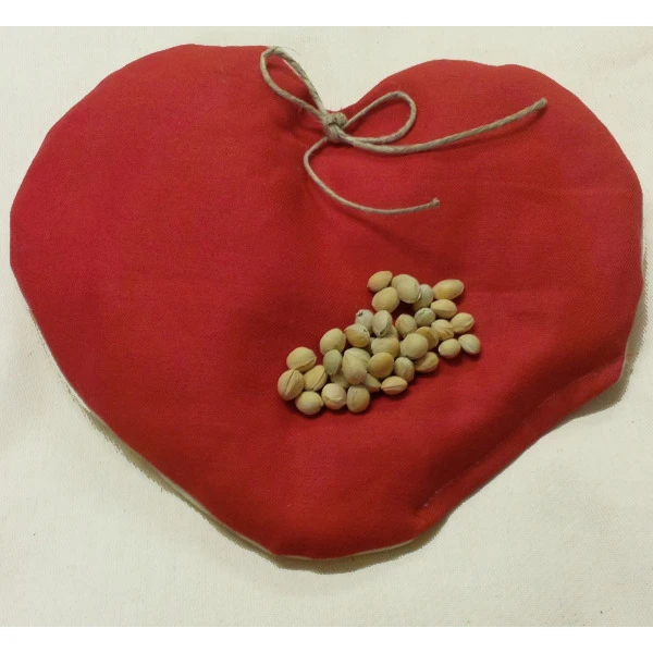 Heart cushion with cherry stones