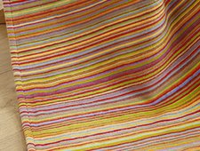 Plaid a righe multicolore in pile di cotone biologico